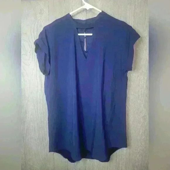 Express royal blue blouse size Medium poly/spandex blend. - Picture 1 of 5
